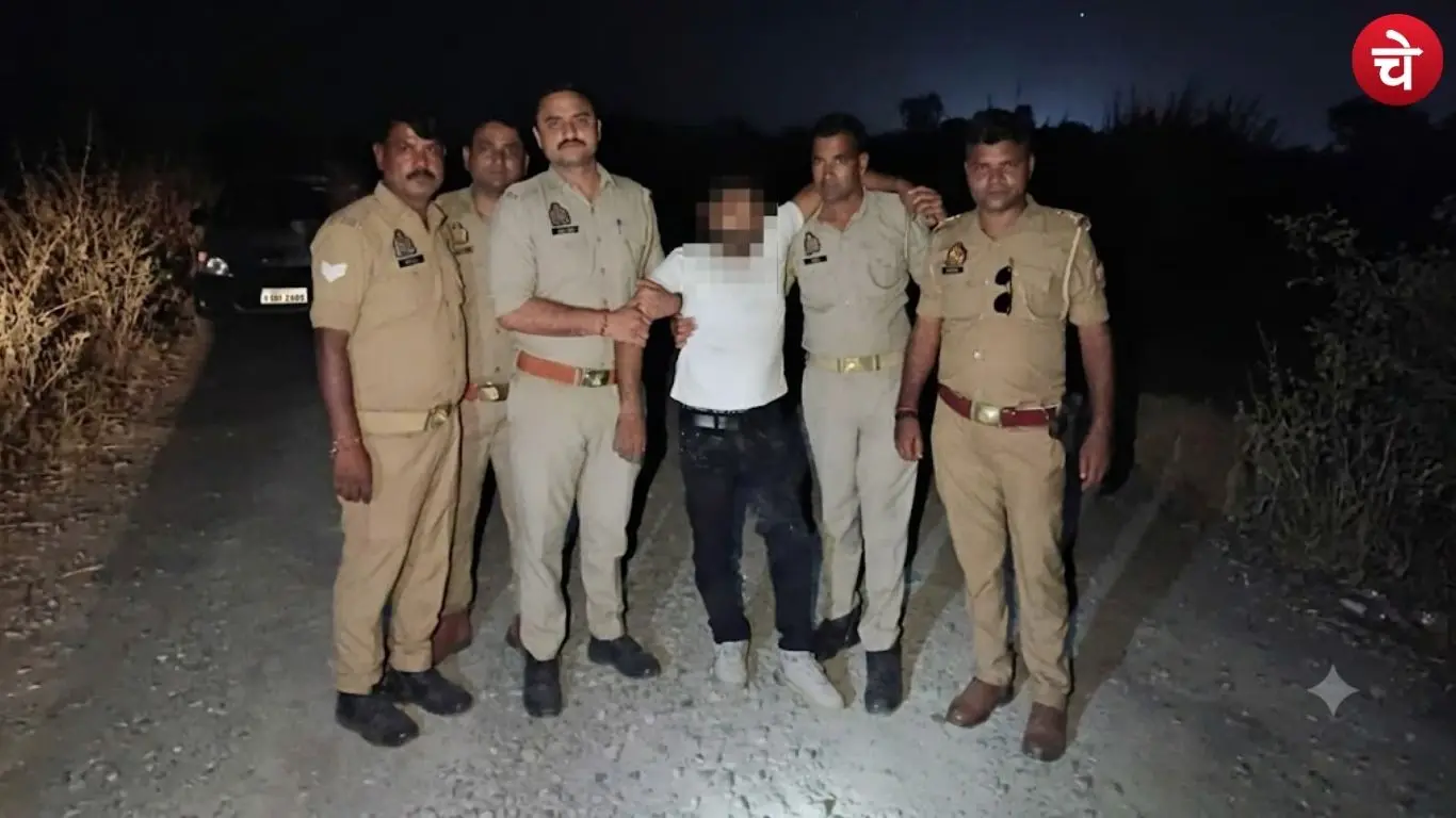 Police taking away an injured accused following an encounter in Bharthana